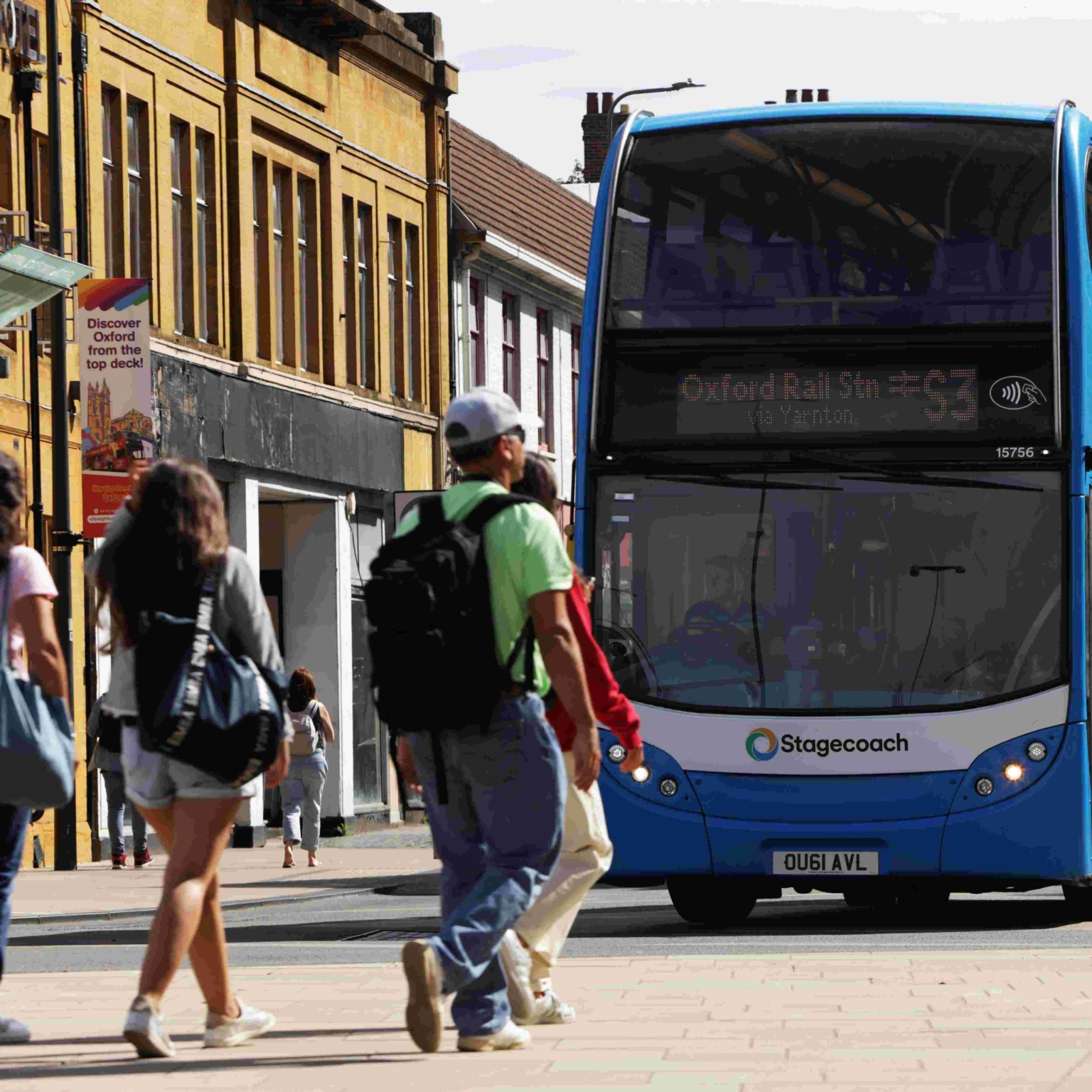 a bus and pedestrians in Oxford